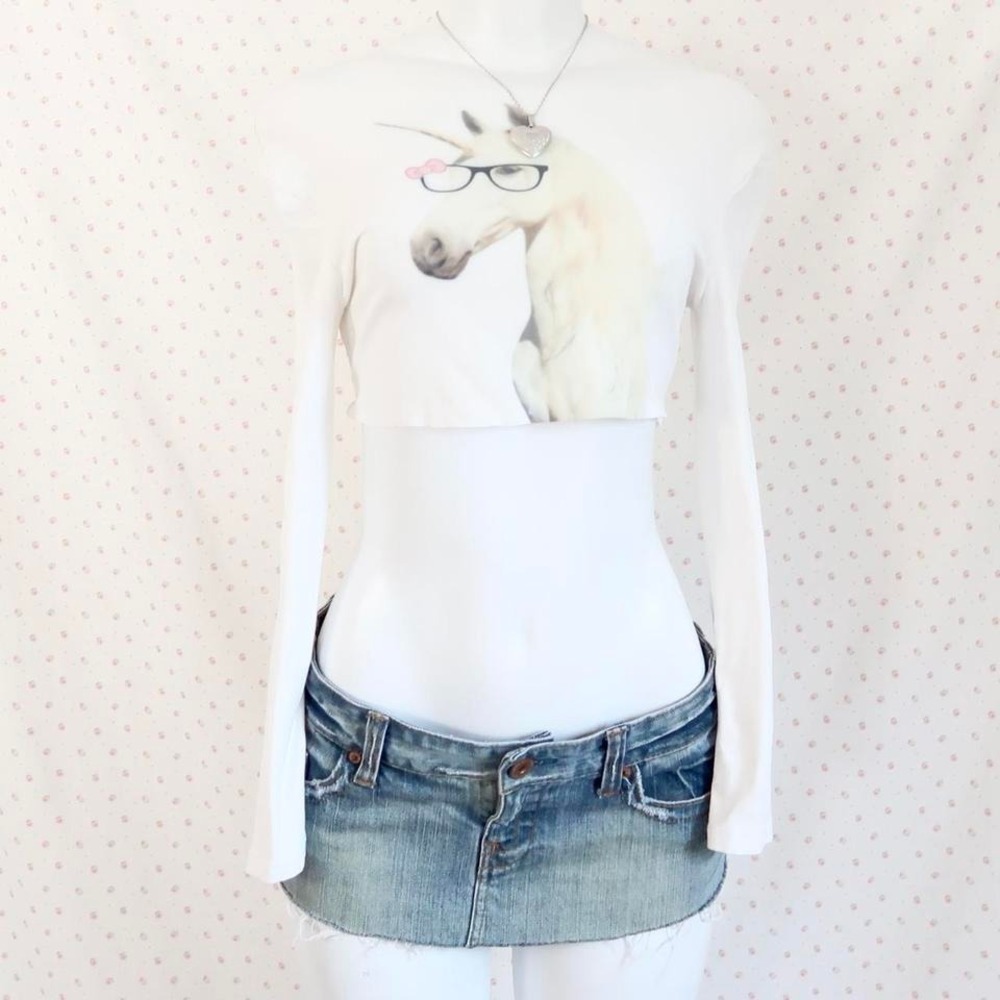 white cropped long sleeve unicorn graphic top raw hem y2k baby tee